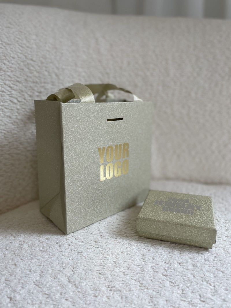 BOLSA DE PAPEL LUJO DORADA CON BRILLOS – XS (16x8x16 cm)
