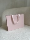 BOLSA DE PAPEL LUJO ROSA – ASAS ROSAS – S (25x10x20 cm)