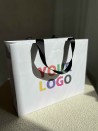 LUXURY PAPER BAG WHITE – BLACK HANDLES – S (25x10x20 cm)