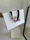LUXURY PAPER BAG WHITE – BLACK HANDLES – M (35x12x25 cm)