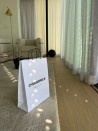 Sac kraft Blanc M – Avec Poignées Noires Et Logo Bien En Vue