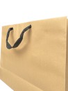 Bolsa de papel kraft con asas de cinta negra