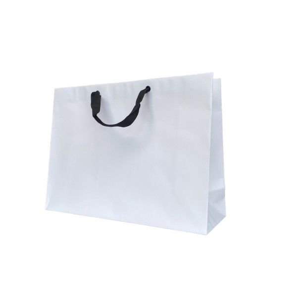 Bolsa de papel blanca con asas de cinta negra