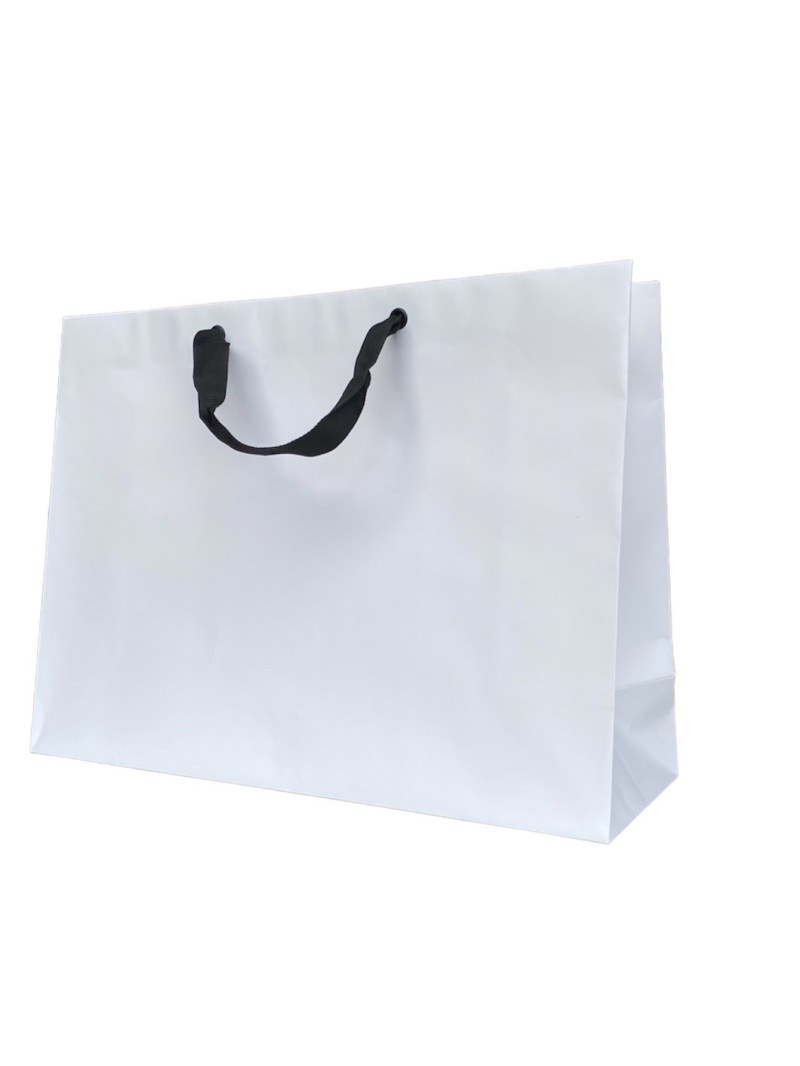 Bolsa de papel blanca con asas de cinta negra